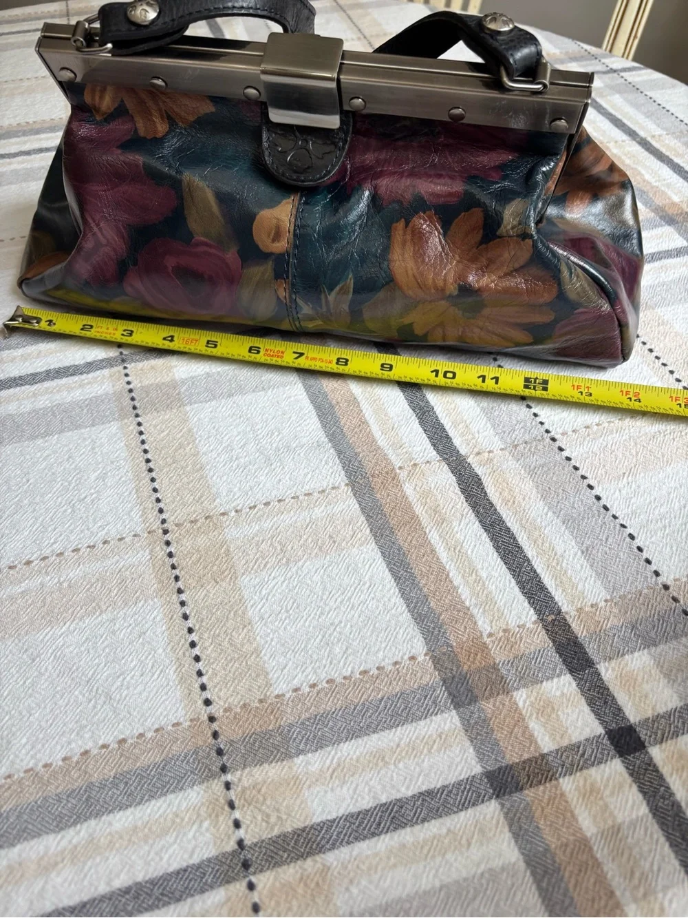 Patricia Nash Ferrara satchel purse. Dark multicolored floral leather print